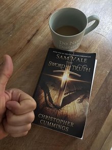 Reader George with his copy of Sam Vale: The Sword of Truth